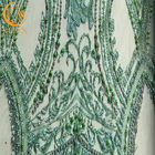 La tela moldeada verde sofisticada del cordón/ata la tela material para el vestido nupcial