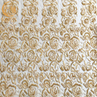 El oro Tulle bordó la tela hecha a mano pesada moldeada del cordón para los vestidos