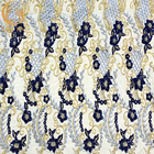 El Applique azul del bordado 3D del ODM ata la tela para los vestidos del desfile de moda