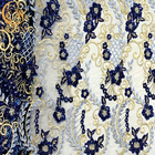 El Applique azul del bordado 3D del ODM ata la tela para los vestidos del desfile de moda