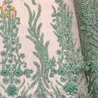 Anchura nupcial de la tela el 140Cm del cordón del vestido moldeado verde elegante del ODM